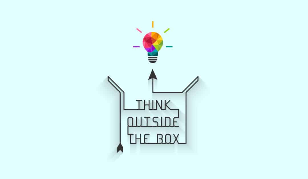 Think outside the box illustrated concept with words written within the lines of an arrow and box outline, leading to a colorful lightbulb idea, illustrating the blog topic, Spanish Business Idioms